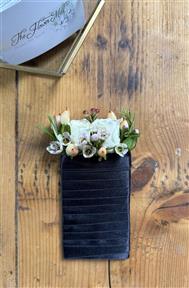 Modern pocket square buttonhole of flowers