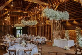 Wedding breakfast with floating gyp clouds at the barn at Redcoats